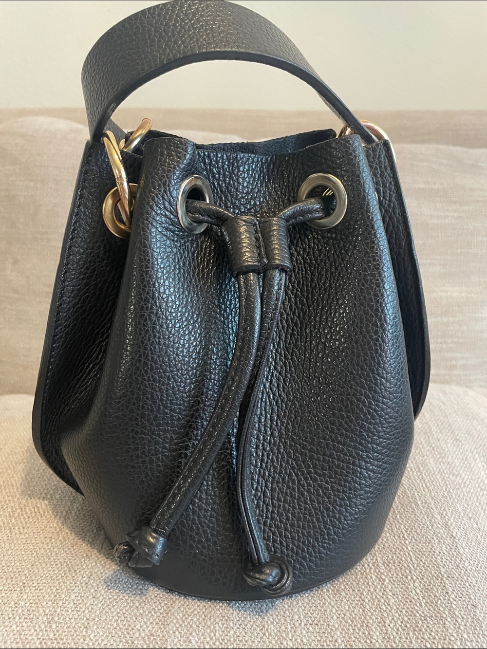 Black Pebbled Leather Drawstring Shoulder Bag . Made in Italy.